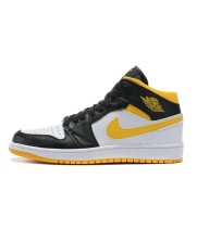 Кроссовки Nike Air Jordan 1 Mid черно-белые с желтым